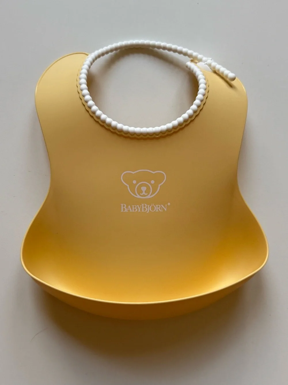 Set of 2 BabyBjorn Feeding Bibs - Blue & Yellow